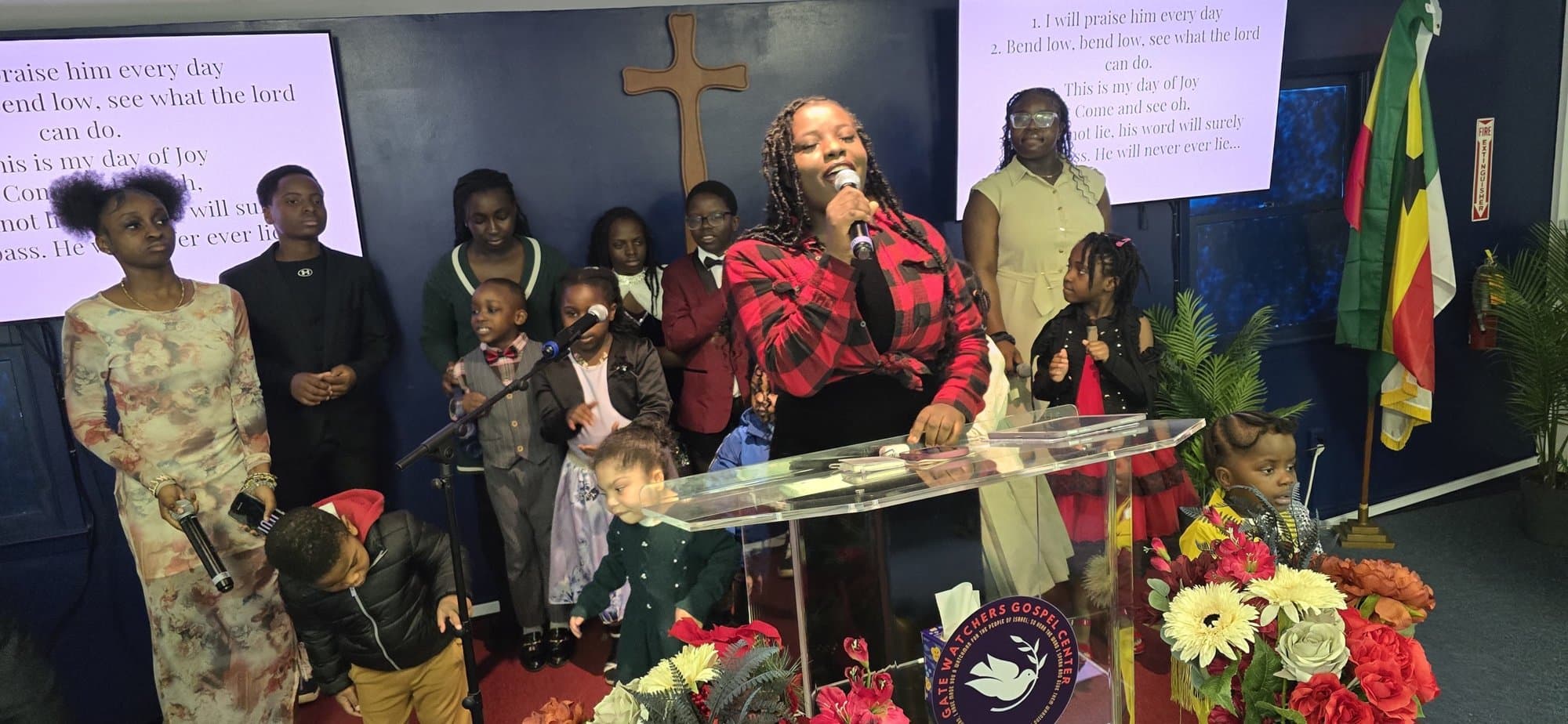 Children singing praise at the front of the sanctuary