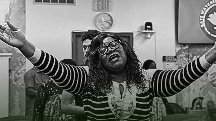 Hands raised in Sunday worship